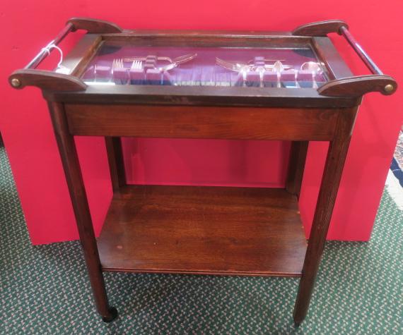Two Tier Mahogany Glass Tray Top Tea Cart w/Flatware:: Two Tier Mahogany Glass Tray Top Tea Cart w/Flatware: Glass Tray with Metal Handles Lifts Out to a Removable Custom Made Fitted Organizing Tray for Flatware. Fluted Decoration on Portion of Legs, on F