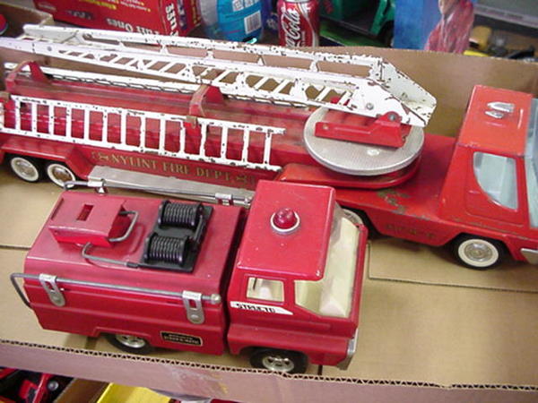 Scale Model Pressed Steel Fire Trucks.: Scale Model Pressed Steel Fire Trucks. Structo Pumper, Nylint Hook and Ladder, Tonka Ladder Truck and Nylint Ladder Truck.