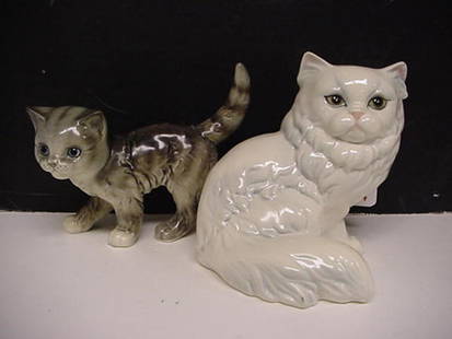 Goebel Standing Gray Cat and Seated White Cat: Goebel Standing Gray Cat and Seated White Cat: Domestic Gray Cat is 6 1/2"L. Seated White Persian is 6"T. Both Marked W. Germany on Underside.