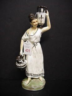 Hand Painted Kutania Greek Porcelain Female Figuri: Hand Painted Kutania Greek Porcelain Female Figurine. 10" T Female in White Gown Carrying Jugs Standing on Oval Plinth.