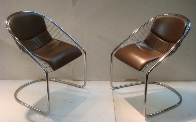 Pair of GORDON GUILLAUMIER CORTINA MINOTTI CHAIRS: Pair of GORDON GUILLAUMIER CORTINA MINOTTI CHAIRS Leather and Chrome Cantilevered Tubular Frame Chair. Wire Webbing Supports Single Construction Chocolate Leather Cushions. Referred to as "Ferrari Cha