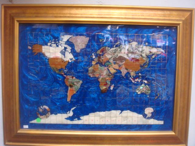Framed Handcrafted Lapis/Jasper Map of the World:: Framed Handcrafted Lapis/Jasper Map of the World: Lapis Mosaic Tile with Hand placed Countries of Various Semi-Precious Gemstones Inlaid to Form Interlocking Shapes. Gold Meridian, Longitude and Latit