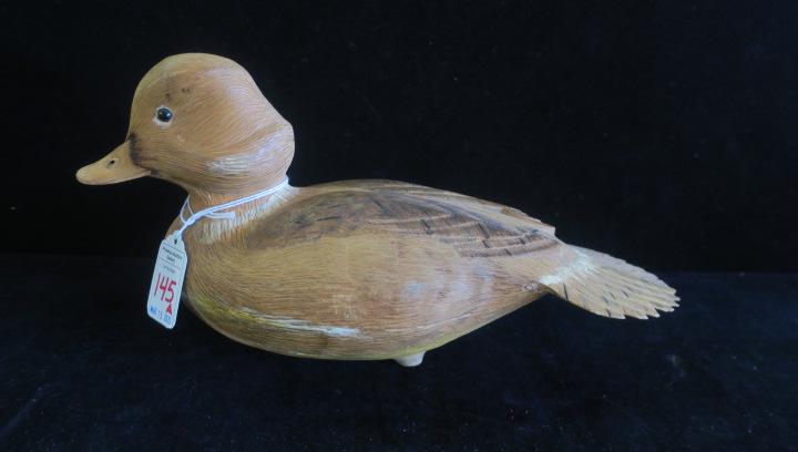 Signed George Rigby Carved Duck Decoy:: Signed George Rigby Carved Duck Decoy: Dated 1982. Finely Carved Buffle Head Duck has Joined Body with Something Rattling Inside. Glass Eyes. Long Island Carver and Waterman. 5 3/4"T, 11 1/2"L. (100-3