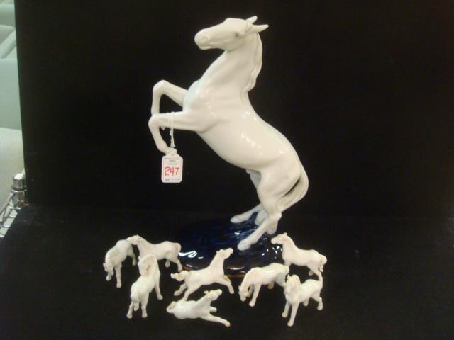 ROYAL DUX Porcelain Lipizzaner Horse and Herd:: ROYAL DUX Porcelain Lipizzaner Horse and Herd: Nicely Modeled White Horse on Cobalt Blue Base with Gold Rim. Marked with Pink Triangle, Foil Label and Hand Painted Made in Czech Republic. 14 1/4"T.Inc