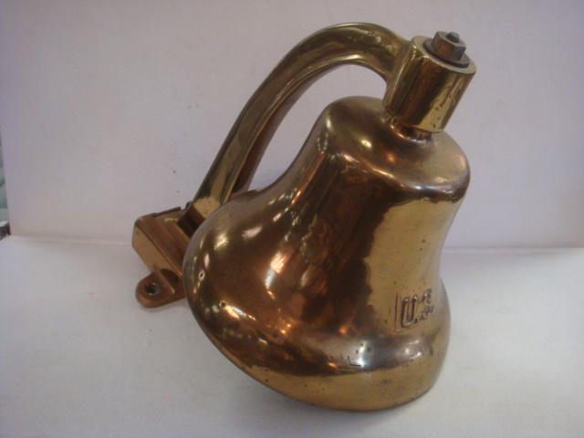 US NAVY Brass Ship's Bell with Mounting Bracket:: US NAVY Brass Ship's Bell with Mounting Bracket: 11" Tall and 9 3/4" Diameter Bell with Mounting Bracket is Total of 16" Tall. SN 2403-2-45. Could be to Call Old Shipmates to the USS Scuttlebutt. (250