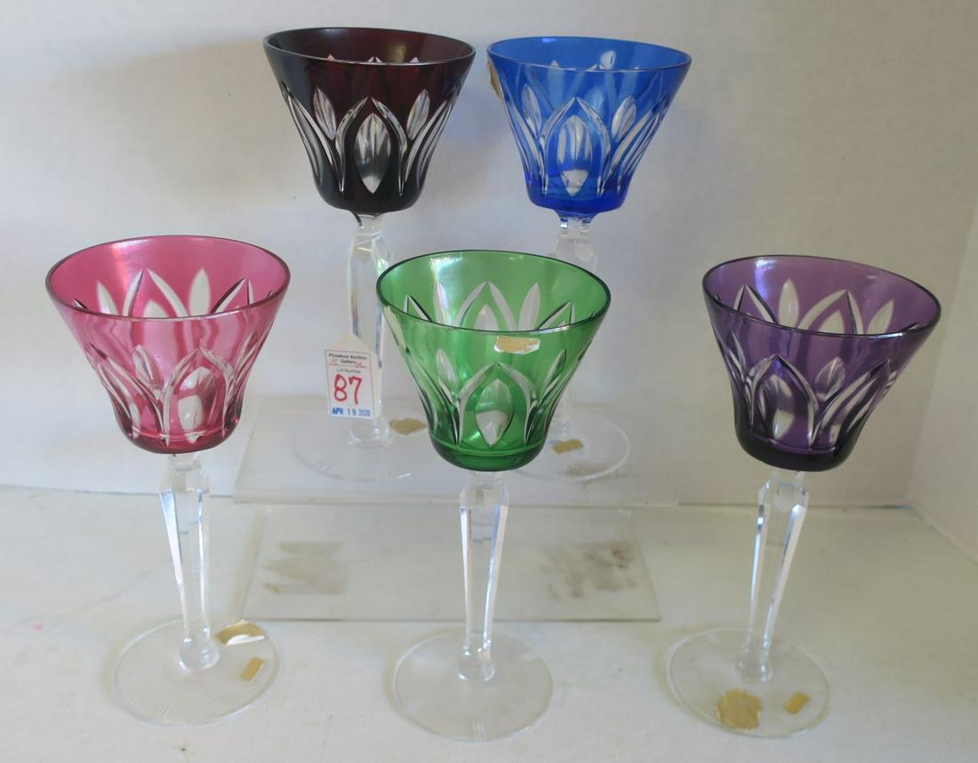 Five German Cut to Clear Crystal Stems:: Five German Cut to Clear Crystal Stems: In Colors of Cranberry, Amethyst, Green, Ruby and Blue with Clear Paneled Stems. AH and Made in Germany Foil Stickers. 8"T. All Five in Same Pattern. (150-250)