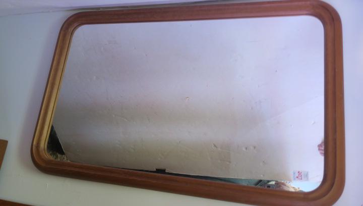 PEDERSEN & HANSEN Danish Teak Mid-Century Wall Mirror:: PEDERSEN & HANSEN Danish Teak Mid-Century Wall Mirror: Classic Minimalist Plate Mirror From High End Company in Denmark. Rounded Edges, Dovetail Joinery. Measures 39" X 24". Circa 1960's. (200-800)