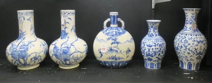 Five Asian Blue and White Chinoiserie Pottery Vases:: Five Asian Blue and White Chinoiserie Pottery Vases: Two Vases with the Same Floral Pattern are 10" and 12 1/2"T. Pair of Fruit and Floral Pattern Vases are 12 1/4"T. Double Handled Pillow Vase with F