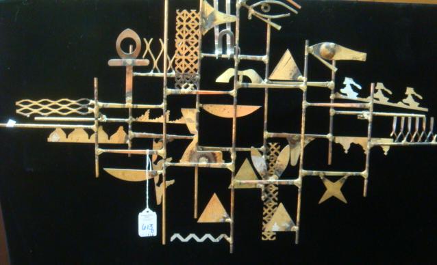 Welded Abstract Metal Wall Sculpture:: Welded Abstract Metal Wall Sculpture: Burnished Metal Shapes, Some Painted. Abstract Arrangement of Textures, Shapes and Sizes in Horizontal and Vertical Pattern in Layered Composition. 17"T X 29"W. (