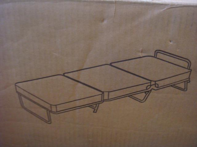 Travel or Extra Cot, Still in Shipping Box:: Travel or Extra Cot, Still in Shipping Box: Ottoman Bed with Mattress and Metal Spring and Frame. See Pictures. (100-200)