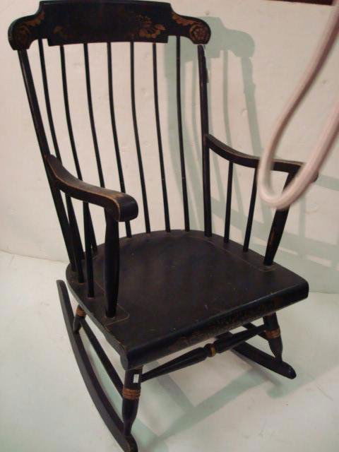 Salem Style Spindle Back Black Rocker: 34. Salem Style Spindle Back Black Rocker: Painted Black with Gold Stenciling and Highlights. Curved Spindle Back. Minor Paint Rubbed.