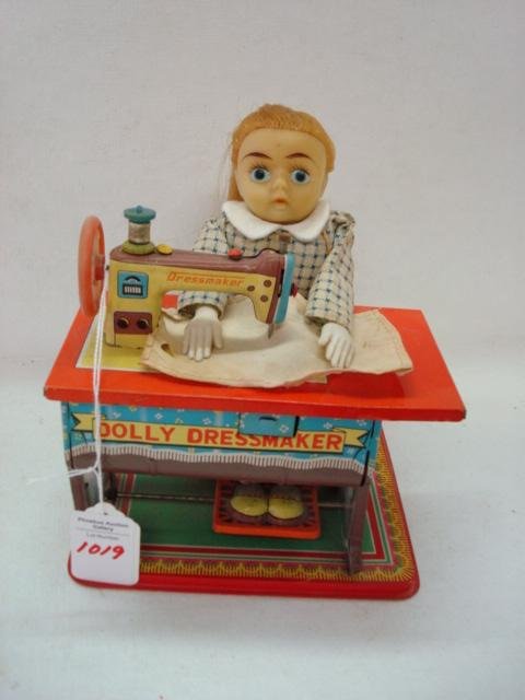 DOLLY DRESSMAKER Tin Litho Toy Sewing Machine