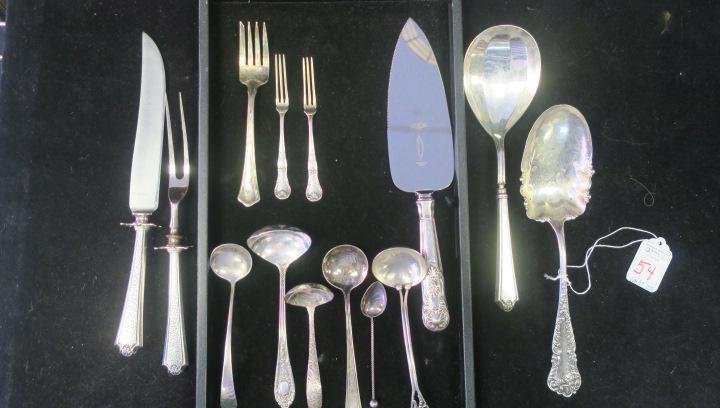 Fourteen Assorted Sterling Silver Serving Pieces:: Fourteen Assorted Sterling Silver Serving Pieces: JB & SM Knowles CA 1875-1905 9 1/8" Serving Spoon. 9"L Hollow Handle Serving Spoon, Carving Knife & Fork, Four Assorted Maker Cream/Sauce Ladles. Two 