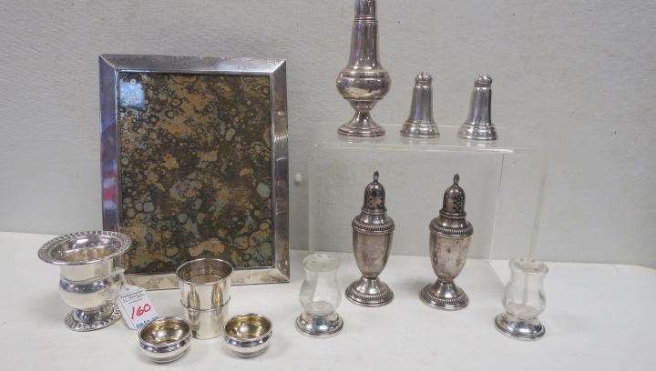 Assorted Sterling Shakers, Salts, Jigger and Urn:: Assorted Sterling Shakers, Salts, Jigger and Urn: Pair of Watrous 5"T Shakers, Single Empire 5 1/4"T Sterling on Glass Shaker, Pair of 2 3/8"T Shakers, Pair of Raimond Etched Glass Shakers with Sterli