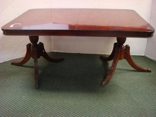Mahogany Double Pedestal Dining Table, Six Chairs:: Mahogany Double Pedestal Dining Table, Six Chairs: Table Measures 62"W, Set on Duncan Phyfe Style Pedestals with Splayed Grooved Legs Ending in Brass Paw Capped Feet. 5 Side and one Arm Chair Each wit