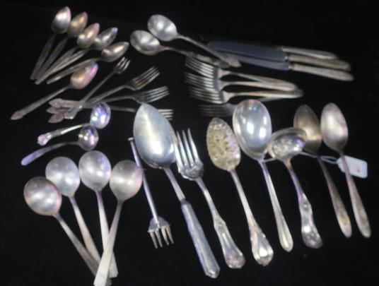 Collection of Antique Silver-plate Flatware, 33 Pcs:: Collection of Antique Silver-plate Flatware, 33 Pcs: Includes Forks, Knives, Ladles, Soup and Serving Spoons and Fork, Grapefruit Spoons, Cocktail Fork and Fruit Spoon. Makers Include Community, Roger