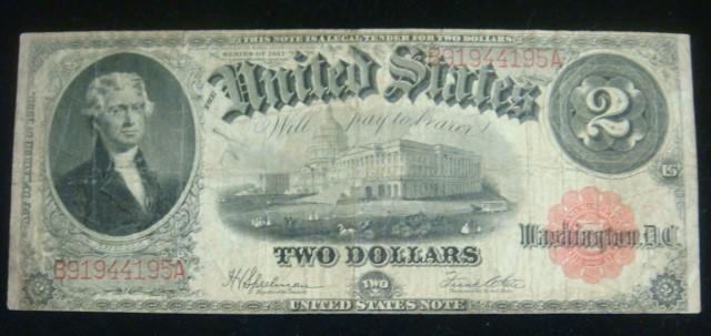 Two Dollar Note, 1917 Legal Tender Note, Large Size:: Two Dollar Note, 1917 Legal Tender Note, Large Size: Jefferson to Left with Capitol Centered on Front, Back with Shield and Circles Design. Signed Speelman/ White with Red Seal. Very Good Condition, (