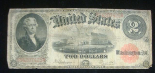TWO DOLLAR NOTE, 1874, LARGE SIZE, LEGAL TENDER, 1917:: TWO DOLLAR NOTE, 1874, LARGE SIZE, LEGAL TENDER, 1917: JEFFERSON on Left US Capitol Centered on Front. Shields and Circles on Back. Signed Speelman/White. Good Condition, Circulated. (50-100)