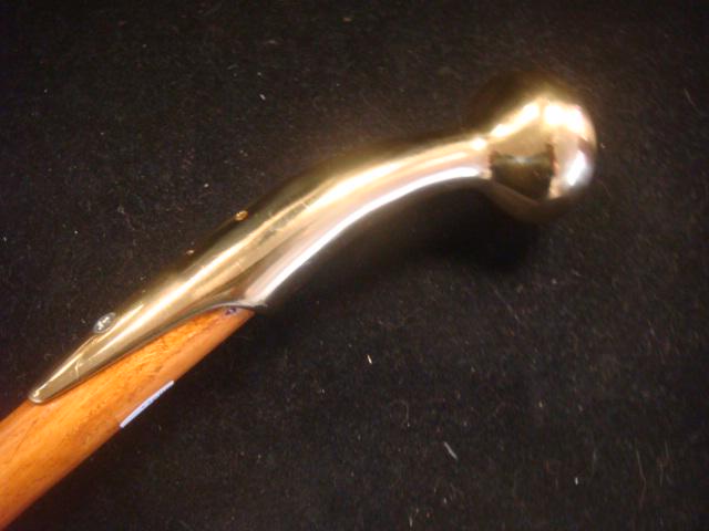Vintage Brass Doorknob Topped Cane:: Vintage Brass Doorknob Topped Cane: Brass Doorknob shaped Handle Grip on Wooden 36" Cane with Rubber Tip. (100-200)