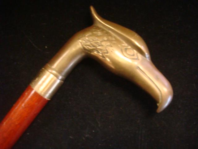 Vintage Brass EAGLE HEAD Topped Cane:: Vintage Brass EAGLE HEAD Topped Cane: Brass Eagle Head shaped Handle Grip on Wooden Pool Que Shaft 34" Cane with Brass Tip. (100-200)