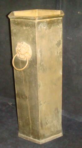 Vintage Hexagonal Brass Cane or Umbrella Stand:: Vintage Hexagonal Brass Cane or Umbrella Stand: Stand has Lion Head with Ring on Two sides. 23" Tall x 10" Diameter. Weighted Disk in Bottom. (80-160)