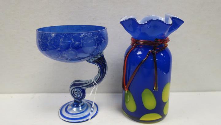 Two Art Glass Cobalt Footed Bowl and 8"T Vase:: Two Art Glass Cobalt Footed Bowl and 8"T Vase: Unique Hand Blown Mottled Art Glass Bowl with S Curved Rod to Round Foot in the Manner of Jozefina Krosho is 7 1/8"T. Ruffle Neck Blue and Yellow Cased G