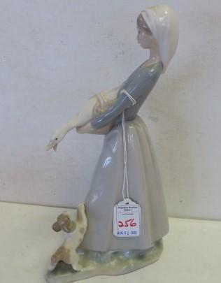 LLADRO #4866 Girl With Goose and Dog:: LLADRO #4866 Girl With Goose and Dog: Vintage Figurine is 10 1/2"T. No Chips or Cracks. Typical Soft Muted Colors. Look Like Puppy and Goose are Communicating. (60-120)