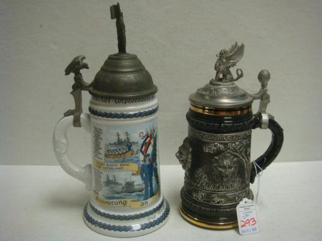 Pair of German Beer Steins; LION STEIN & TORPEDO BOAT:: Pair of German Beer Steins; LION STEIN & TORPEDO BOAT: LION STEIN, Original THEWALT, Limited Edition #272 of 5000, Made in Germany. 9" T. Pewter Lid with Griffon, Pewter Lions Heads on Sides. Repro TO