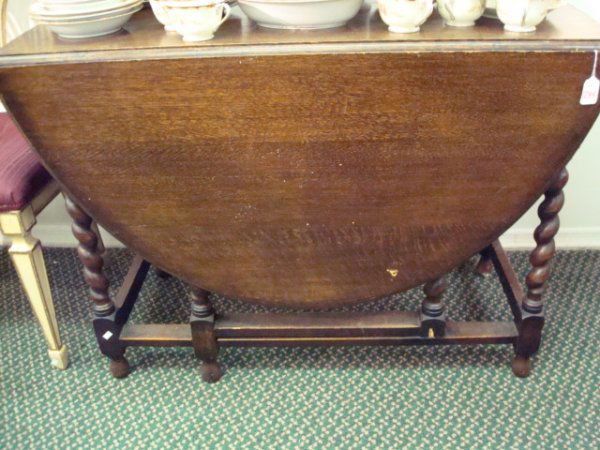 Oak Drop Leaf Dining Table with Barley Twist Legs: 1284. Oak Drop Leaf Dining Table with Barley Twist Legs: Gate Leg Table is 28"T X40"L X 18 1/2"D with 18" Drop. Age Appropriate Wear.