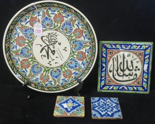 Four Pcs. Asian Ceramic Platter & 3 Hot Plates:: Four Pcs. Asian Ceramic Platter & 3 Hot Plates: Two 4"X4" Decorative Tiles with Foot Pads, One 7 3/4" Square Tile with Arabic Writing at Center. One 12 1/2" Diameter Platter with Stylized Flowers & Wr