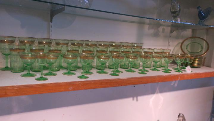 Quality Green Glassware with Etched Gold Banding:: Quality Green Glassware with Etched Gold Banding: Includes 10 Wine Stems. 12 Water Goblets, 12 Martini Stems, 7 Cordials. All Textured High Quality Glass with Wide Etched Bands of Gold. 10 Matching 8"