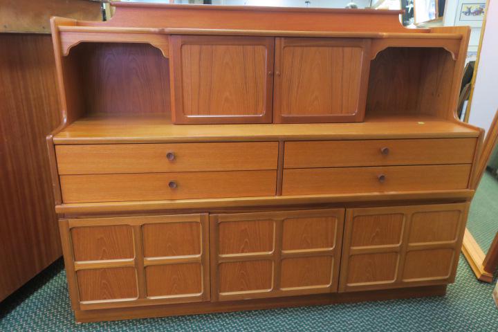 PARKER-KNOLL Mid-Century Modern Teak Sideboard:: PARKER-KNOLL Mid-Century Modern Teak Sideboard: Top Section with Center Blind Doors that open to Glass Shelf, Flanked by Display Space on Each Side. Four Drawers with Wood Pulls over Three Blind Doors