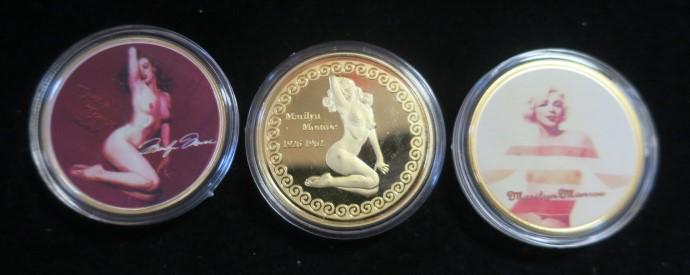 Three 1 Troy OZ MARILYN MONROE Medals:: Three 1 Troy OZ MARILYN MONROE Medals: Obverse features Famous Playboy #1 Centerfold of Marilyn Monroe 1926-1962, Reverse is Full Color Painted Nude Coin of Marilyn. (100-200)