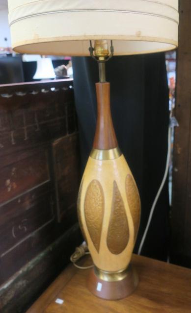 Pair of Mid Century F.A.I.P. Chalkware Lamps:: Pair of Mid Century F.A.I.P. Chalkware Lamps: Textured Yellow Plaster Bases with Gilt Drops. Metal and Teak Foot and Top. 39"T to Top of Harp. Marked F.A.I.P. (Fine Arts in Plaster). (150-400)