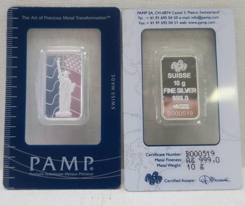 Two Swiss 10 GM .999 Fine Silver Ingots by PAMP:: Two Swiss 10 GM .999 Fine Silver Ingots by PAMP: Packaged with Certificate of Authenticity. Decorated with Statue of Liberty and American Flag on Obverse. Serial Numbered. By PRODUTS ARTISTIQUES METAU