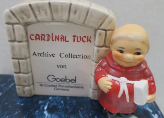 GOEBEL Red FRIAR TUCK ARCHIVE Porcelain Signboard:: GOEBEL Red FRIAR TUCK ARCHIVE Porcelain Signboard: One of 300 with Certificate of Authenticity. Initials MB. With Original Packaging, 3 1/2" x 5". (60-120)