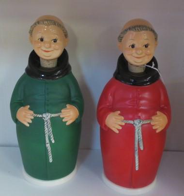 GOEBEL, 2 FRIAR TUCK DECANTERS with CIGARETTE HOLDER:: GOEBEL, 2 FRIAR TUCK DECANTERS with CIGARETTE HOLDER: Decanter Lifts to reveal Frog Style Cigarette Holder. with Friar Tuck Head and Cork Stopper. One Red and One Blue. (150-300)