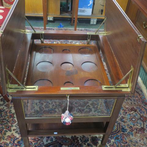 Pop-up Tea Table or Display Cabinet:: Pop-up Tea Table or Display Cabinet: Cabinet is Fitted for Six Place Piece Tea Set. Wooded Top Opens up to Allow Tea Service to Rise. Dimensions Closed is 25 3/4" x 24 3/4" X 27" Top Opens to 48 3/4" 
