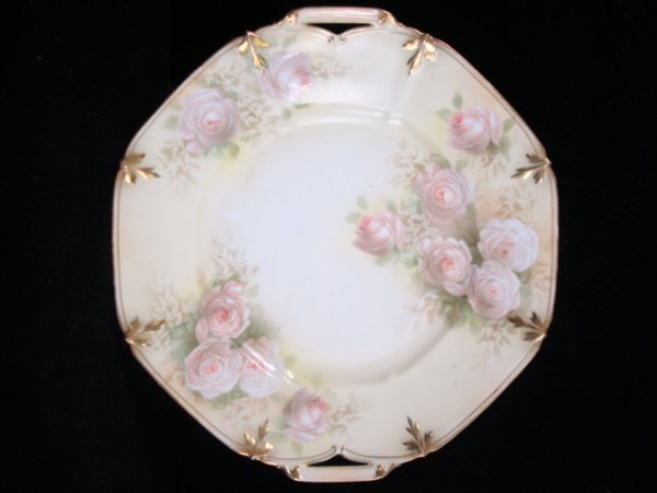 R.S. PRUSSIA Red Mark Cake Plate and Sugar Bowl:: R.S. PRUSSIA Red Mark Cake Plate and Sugar Bowl: 11 1/8"D Octagonal Open Handled Cake Plate with Muted Yellow Ground and Pale Pink Roses. Satin Finish. Gold Accents. 4 1/2"T Handled Sugar Bowl Mold 50