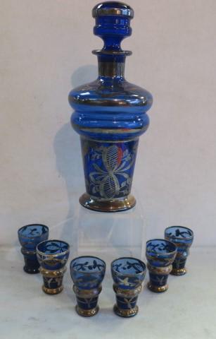 Silver Overlay on Cobalt Glass Decanter & Shots:: Silver Overlay on Cobalt Glass Decanter & Shots: Decanter with Stopper is 9 1/2"T. Six Matching 2 1/4"T Shot Glasses. (60-120)