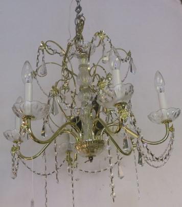 Six Arm Brass Chandelier with Crystal Drapes: Six Arm Brass Chandelier with Crystal Drapes Crystal Center Pole with Crystal Wax Catchers and Beaded Drapes. 18" Tall and 24" Diameter. (150-300)