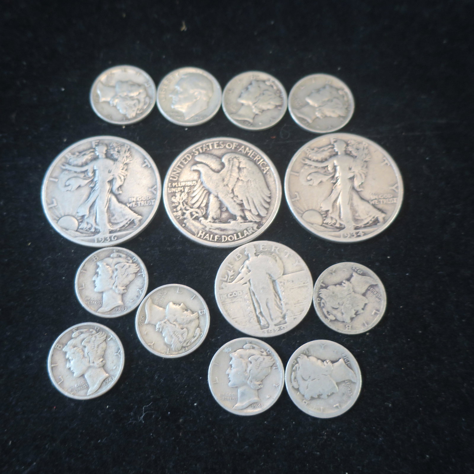2.25 Ounces, .90 Silver, 2 Halves, Quarter, 10 Dimes:: 2.25 Ounces, .90 Silver, 2 Halves, Quarter, 10 Dimes: 3 Walking Liberty Half Dollars, 1934, 36 & 37, a 1929 Standing Liberty Quarter. Nine Mercury Dimes and One 1964 Roosevelt. Circulated Condition. (