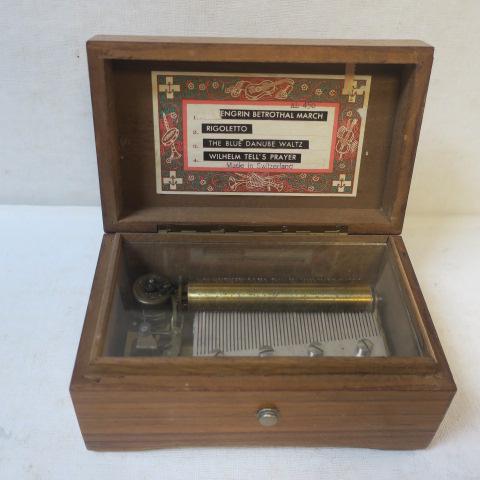 Vintage THORENS Four Song Wind Up Music Box:: Vintage THORENS Four Song Wind Up Music Box: Wooden Box with Inlaid Shield Opens to Cylinder Works Under Glass. Plays Betrothal March, Rigoletto, Blue Danube Waltz and Wilhelm Tell's Prayer. Made in S