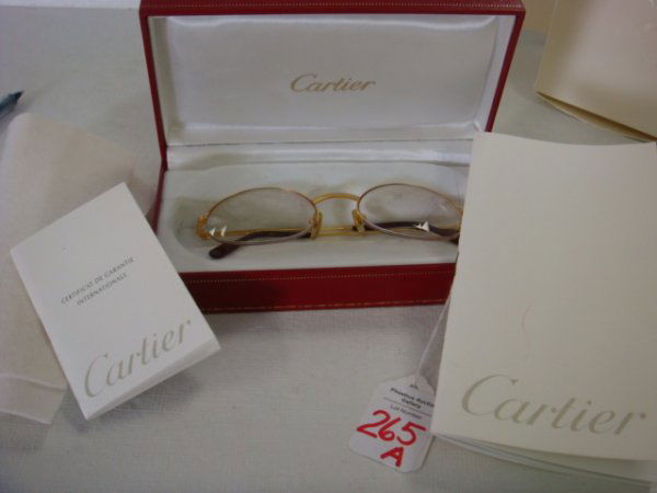 CARTIER French Made Gold Rim Eye Glasses in Case: CARTIER French Made Gold Rim Eye Glasses in Case: CE Stamped to Meet Standards. In Original Red Box, Never Worn. Lenses Can Easily be Changed for your Own