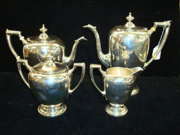 REED AND BARTON Sterling Silver Tea Set: REED AND BARTON Sterling Silver Tea Set: Includes Coffee Pot, Tea Pot, Covered Sugar and Creamer. Has Ivory Insulators. 46 ozt..