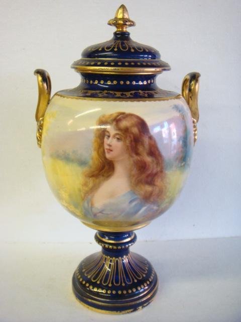 Royal Bonn Covered Urn with Portrait of Woman:: Royal Bonn Covered Urn with Portrait of Woman: Cobalt Lid, Collar and Pedestal with Gilt Accents. Double Handled Urn with Bust of Beautiful Young Girl Set Against Pastoral Background. Scene continues 