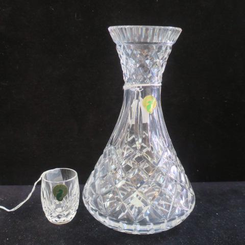 WATERFORD Lismore Irish Shot Glass and Archive Carafe:: WATERFORD Lismore Irish Shot Glass and Archive Carafe: Lismore 3 3/4"T Curved Side Shot Glass. Archive Carafe is 9"T. Both with Waterford Made in Ireland Seahorse Sticker. (100-200)