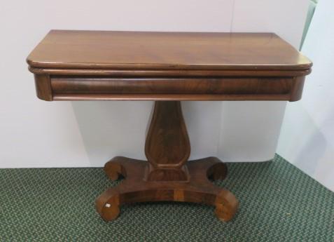 19th C. Figural and Plain Walnut Folding Game Table:: 19th C. Figural and Plain Walnut Folding Game Table: Rounded Front Corners over Bowed Apron. Harp Shaped Pedestal is Set on 4 Way Base with Large Inward Scrolled Feet. 28"T, 39"W, 20"D. Opens to 40"W.