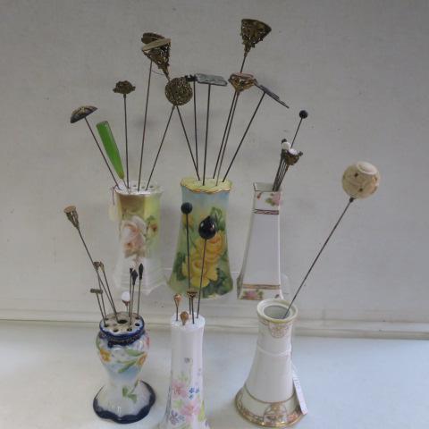 Six Assorted Ceramic Pin Holders/Shakers with Pins:: Six Assorted Ceramic Pin Holders/Shakers with Pins: All Hand Painted. Four Unmarked are 4"T to 5"T. 4 1/2"T Marked Germany and 4 3/4"T Hand Painted Nippon. Two with Stoppered Bottoms. 32 Assorted Hat 