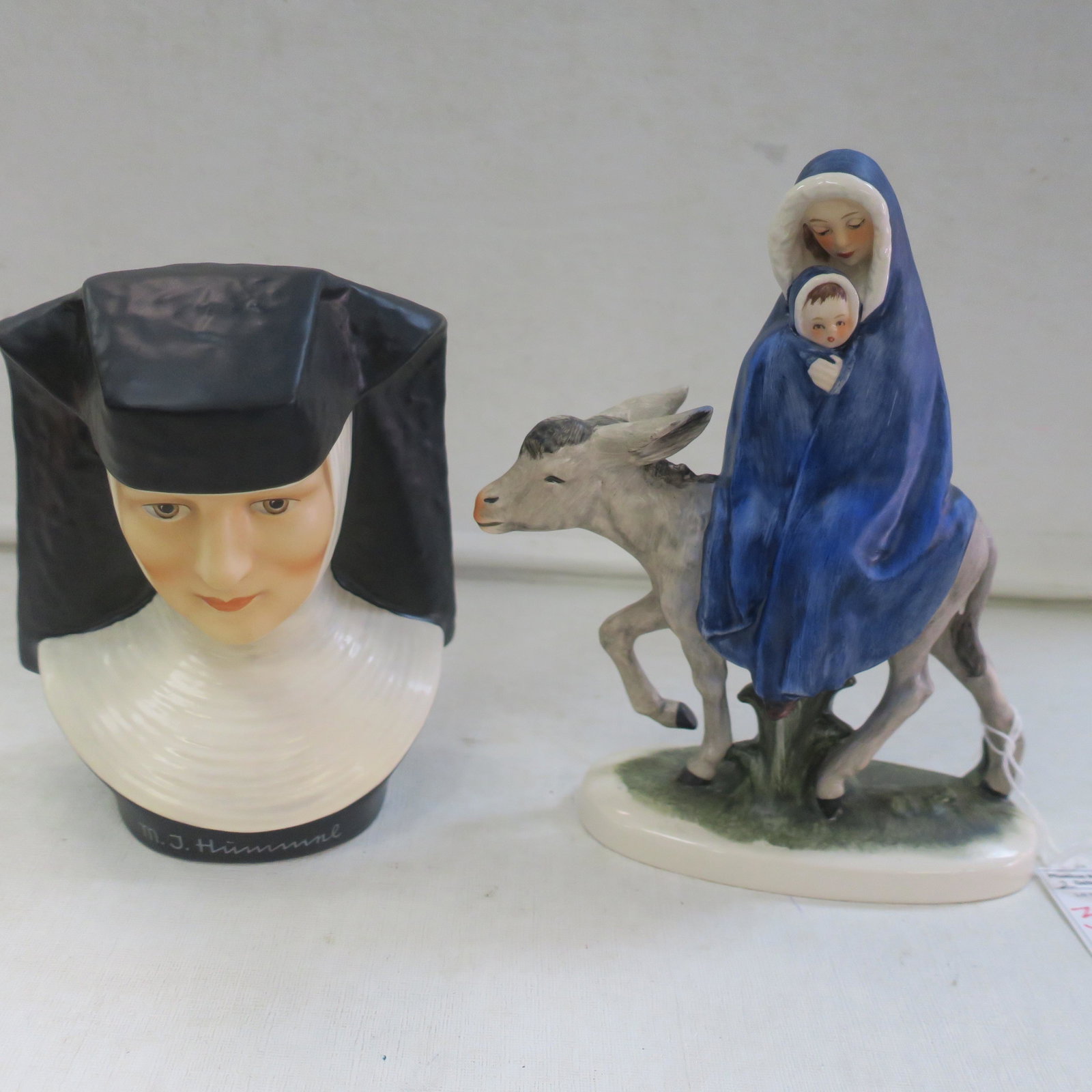 GOEBEL MI Hummel Bust and "Flight Into Egypt":: GOEBEL MI Hummel Bust and "Flight Into Egypt": 1978 Sister MI Hummel Nun Bust, Special Edition #3 Collectors Club. TMK-5. 6"T. Goebel "Flight Into Egypt" with Mary & Jesus on Donkey, Marked Rob 405/A,